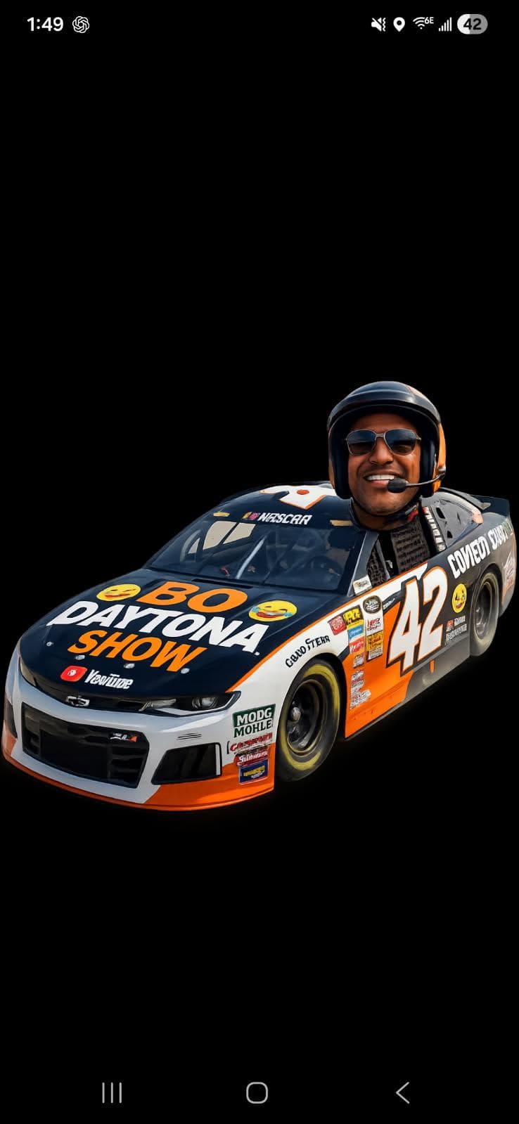 Number 42 NASCAR race car with a man's head in a helmet photoshopped on top.